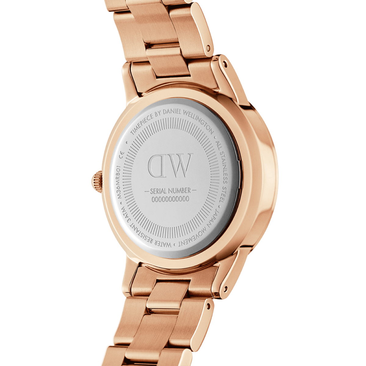 Back view of the Daniel Wellington Iconic Link Amber watch showing the engraved stainless steel caseback and rose gold link bracelet.
