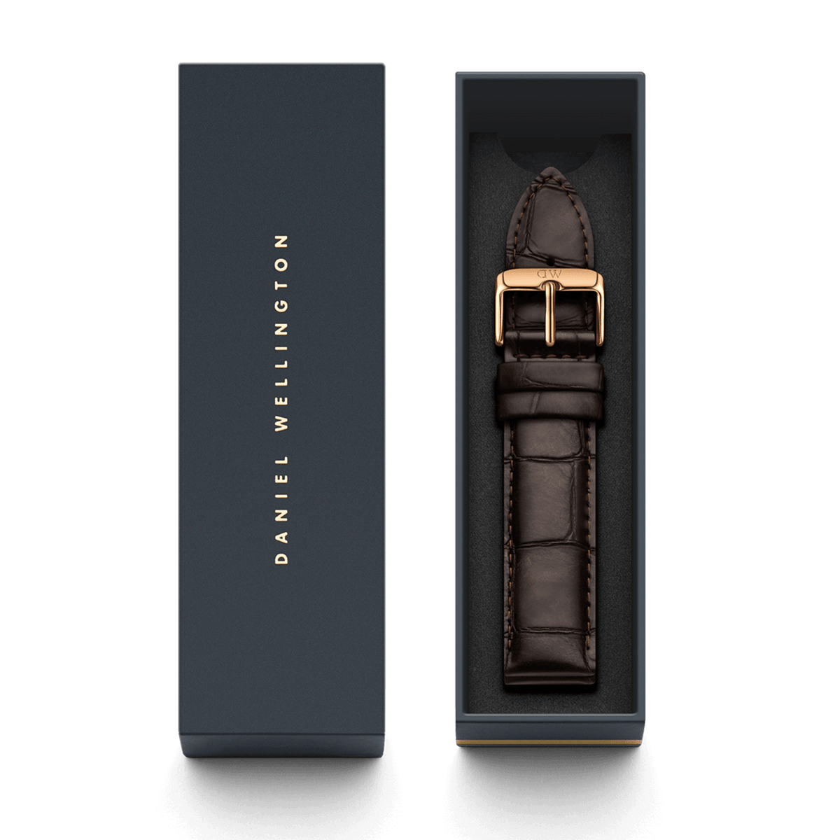 York Strap Rose Gold presented in a Daniel Wellington gift box, featuring deep brown croc-embossed leather and a rose gold engraved buckle for a refined, elegant finish.