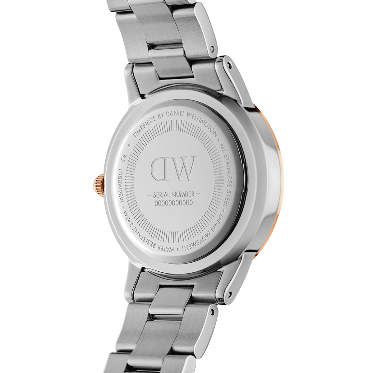 Back view of the Daniel Wellington Iconic Link Lumine watch, showing the engraved stainless steel case, serial number, and two-tone bracelet with rose gold-plated accents.