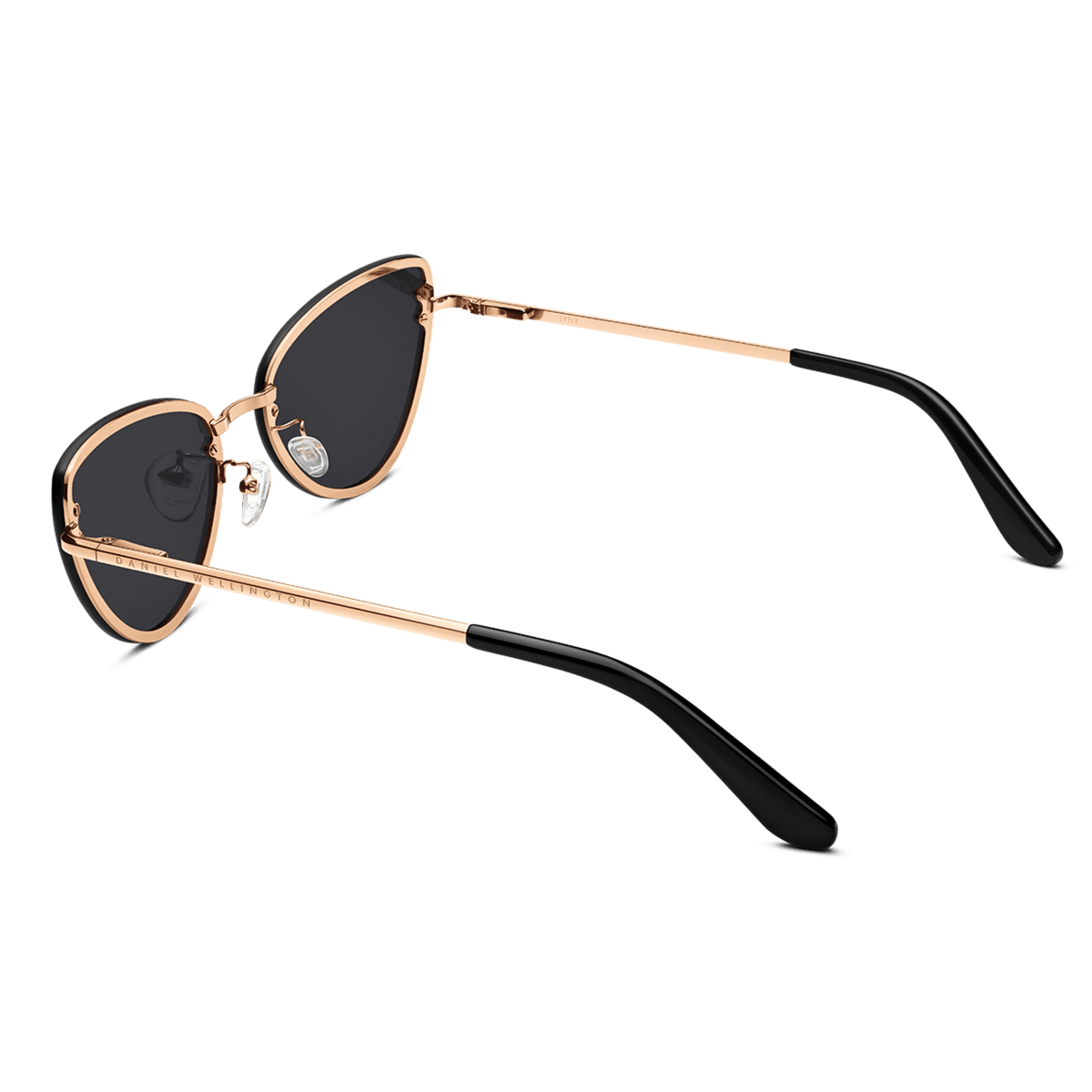 Lynx Steel Black sunglasses with a rose gold stainless steel frame, black cat eye lenses, and comfortable black acetate temple tips.