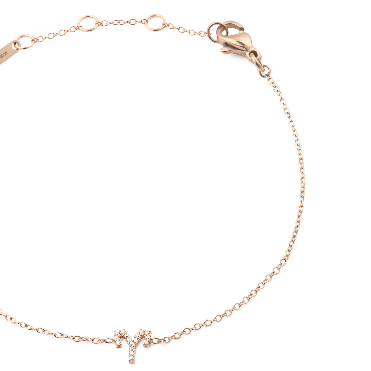 Delicate rose gold chain bracelet with a sparkling Aries zodiac pendant and adjustable sizing rings.