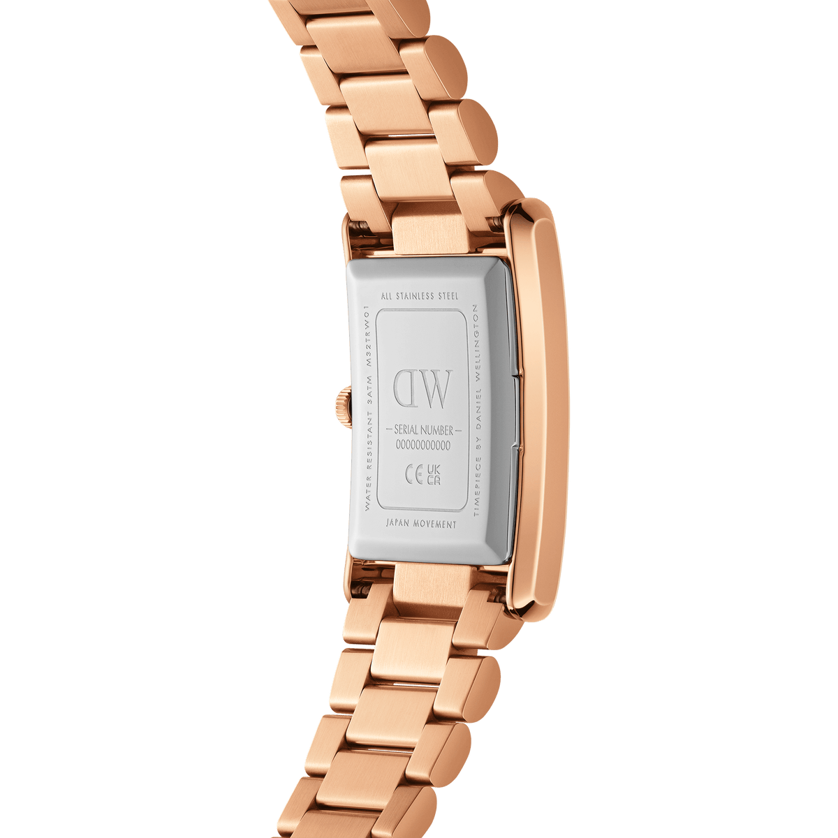 Close-up of the Bound 3-Link Rose Gold watch showing the stainless steel case back, engraved branding, and rose gold three-link bracelet.