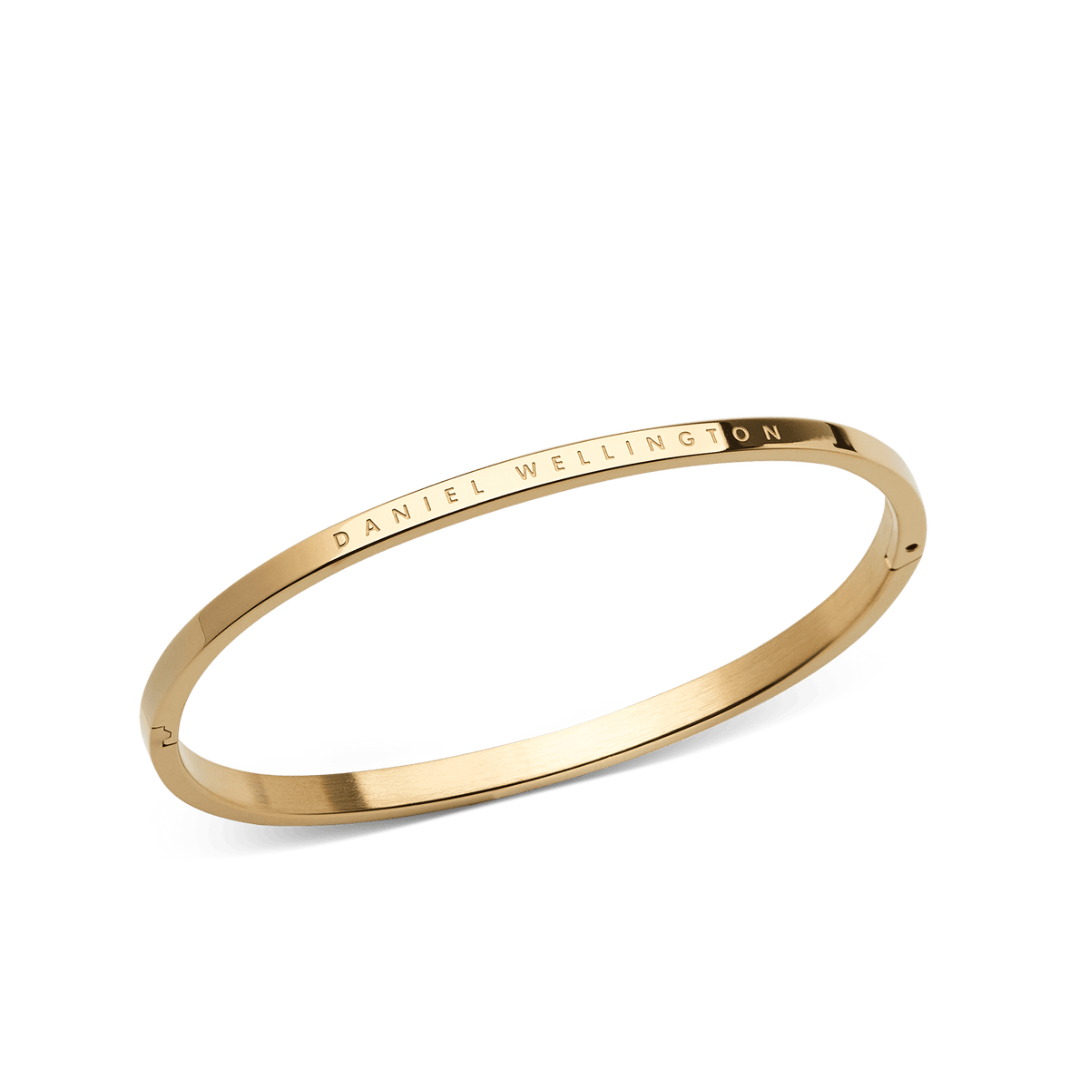 Classic Bangle Gold by Daniel Wellington, a slim polished gold bracelet with subtle engraved branding and a minimalist, elegant design.