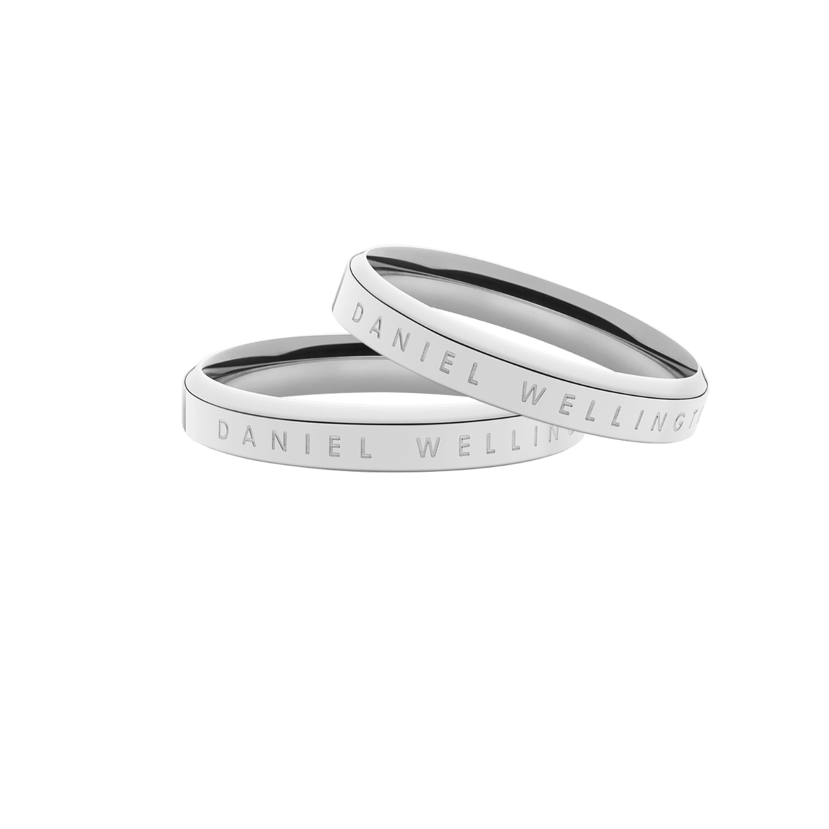 Pair of polished silver Daniel Wellington rings with minimalist band design and subtle engraved branding, presented as a matching set ideal for gifting or everyday wear.