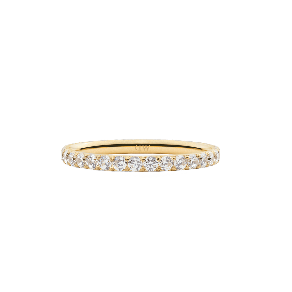 Mirelle Eternity Ring Gold 2mm featuring a slim gold band set with a row of white cubic zirconia crystals, offering a minimalist and elegant look ideal for stacking or wearing alone.