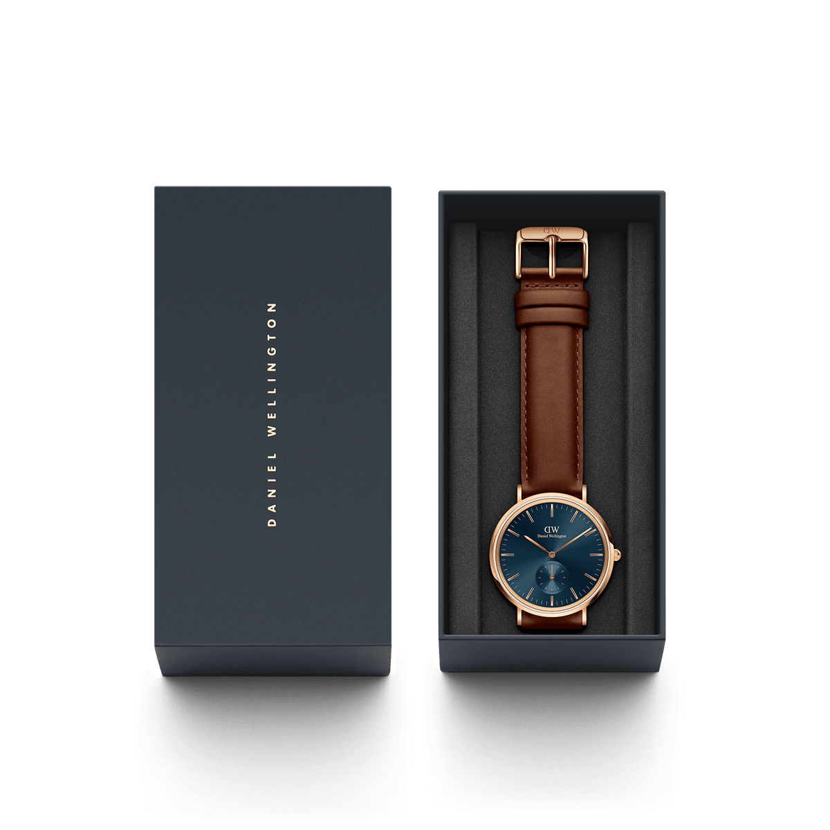 Classic Multi-Eye St Mawes Arctic Rose Gold watch with a blue dial and brown leather strap, presented in an elegant Daniel Wellington gift box.