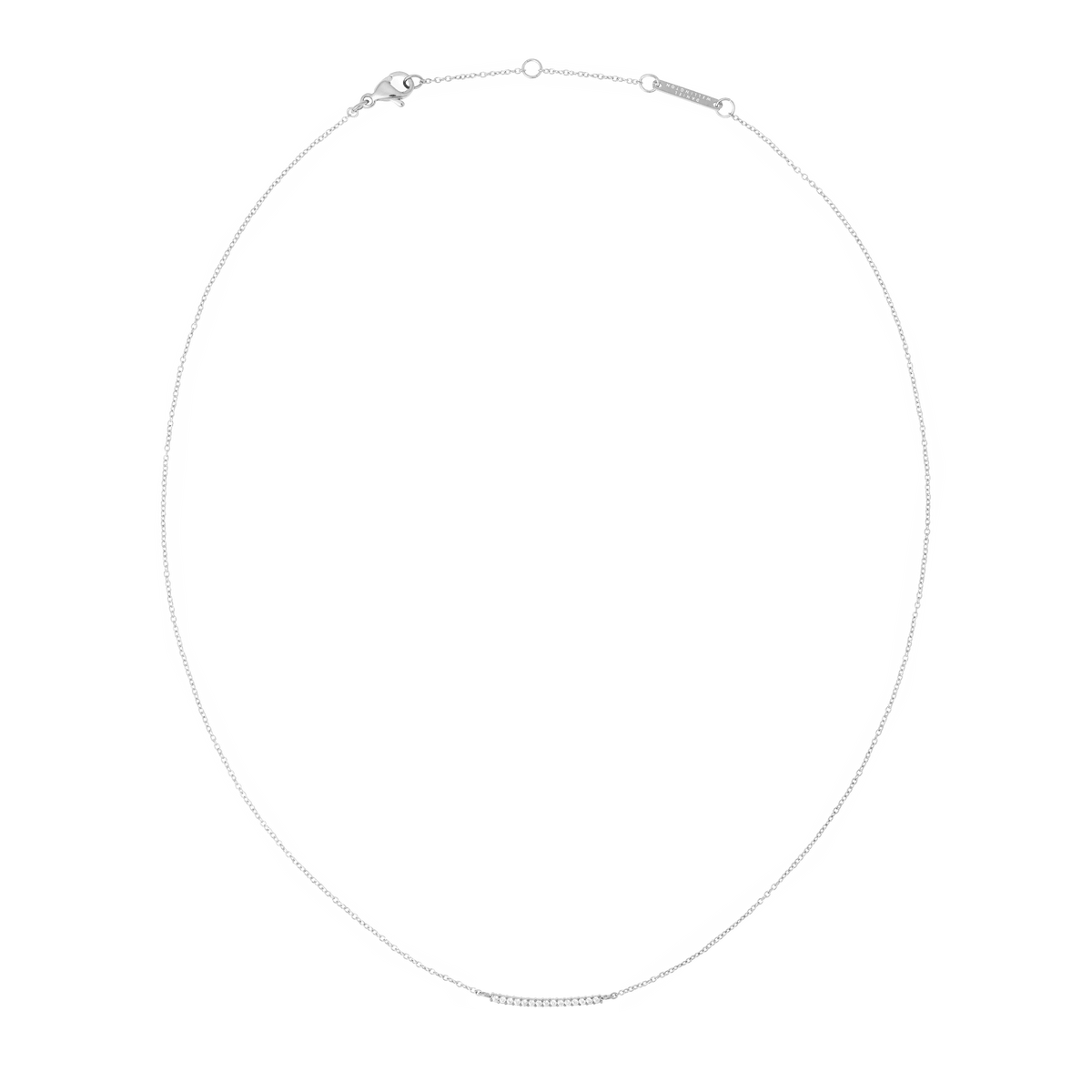Slim silver necklace featuring a delicate bar set with white cubic zirconia crystals on a fine adjustable chain, showcasing minimalist elegance and subtle sparkle.