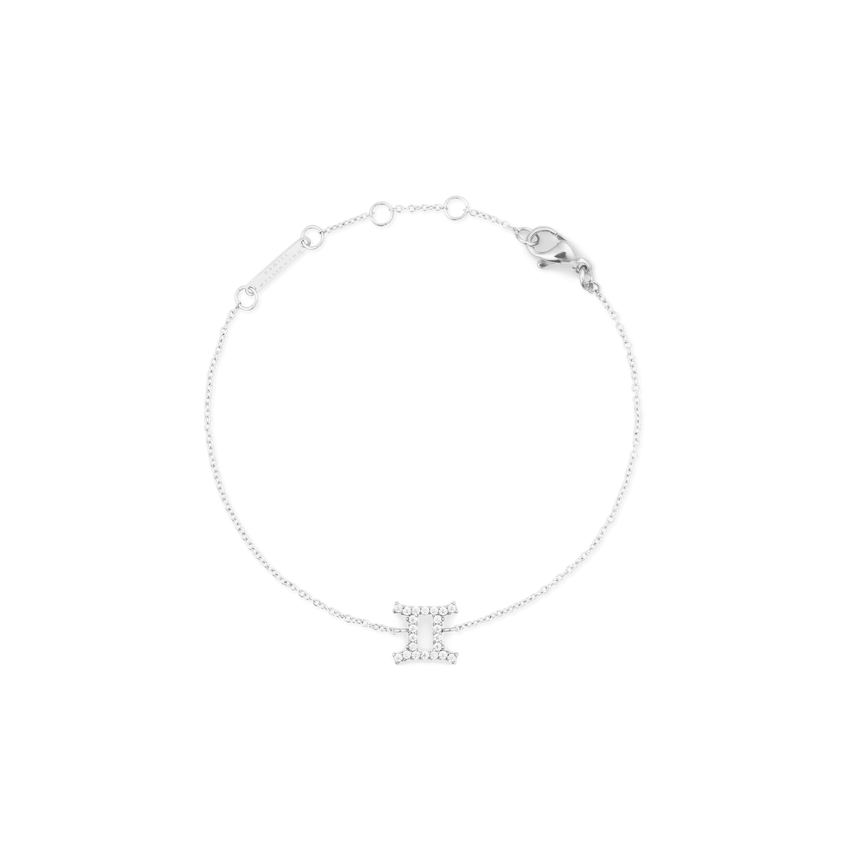 Delicate silver chain bracelet featuring an adjustable fit and a Gemini zodiac charm set with sparkling cubic zirconia crystals.