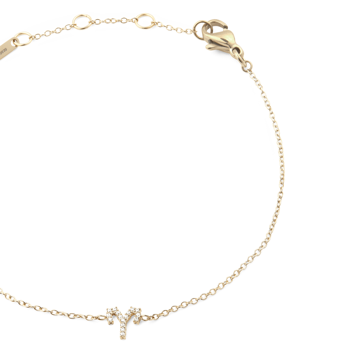 Close-up of the Crystal Zodiac Chain Bracelet Gold with an Aries pendant set with sparkling crystals and an adjustable gold chain.
