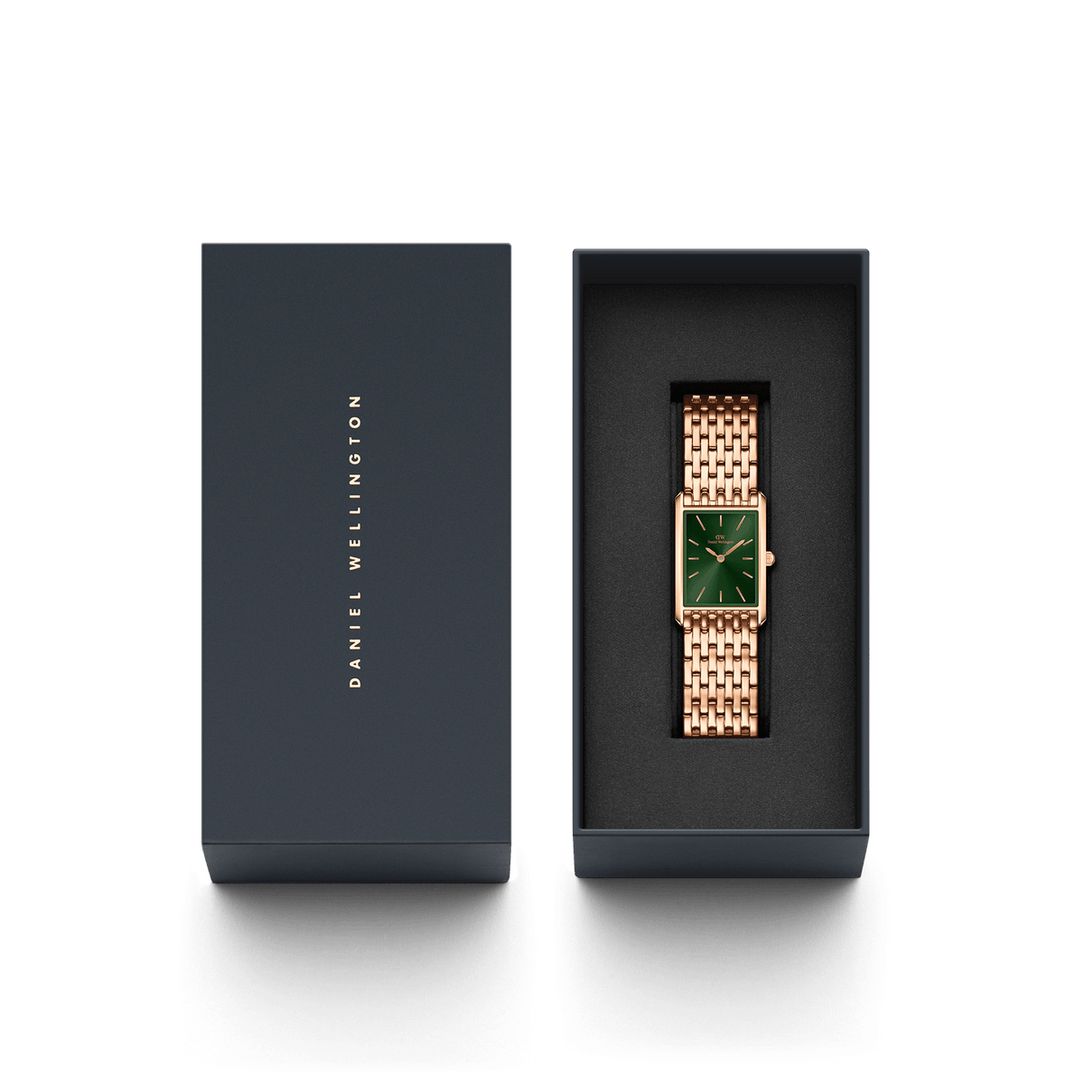 Bound 9-Link Emerald Sunray women’s watch with a rectangular rose gold case and emerald green dial, presented in an elegant Daniel Wellington gift box.