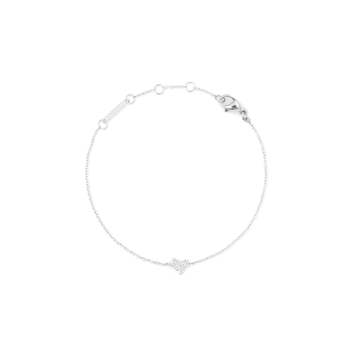 Elegant silver chain bracelet with an adjustable clasp, featuring a minimalist zodiac charm at the centre.