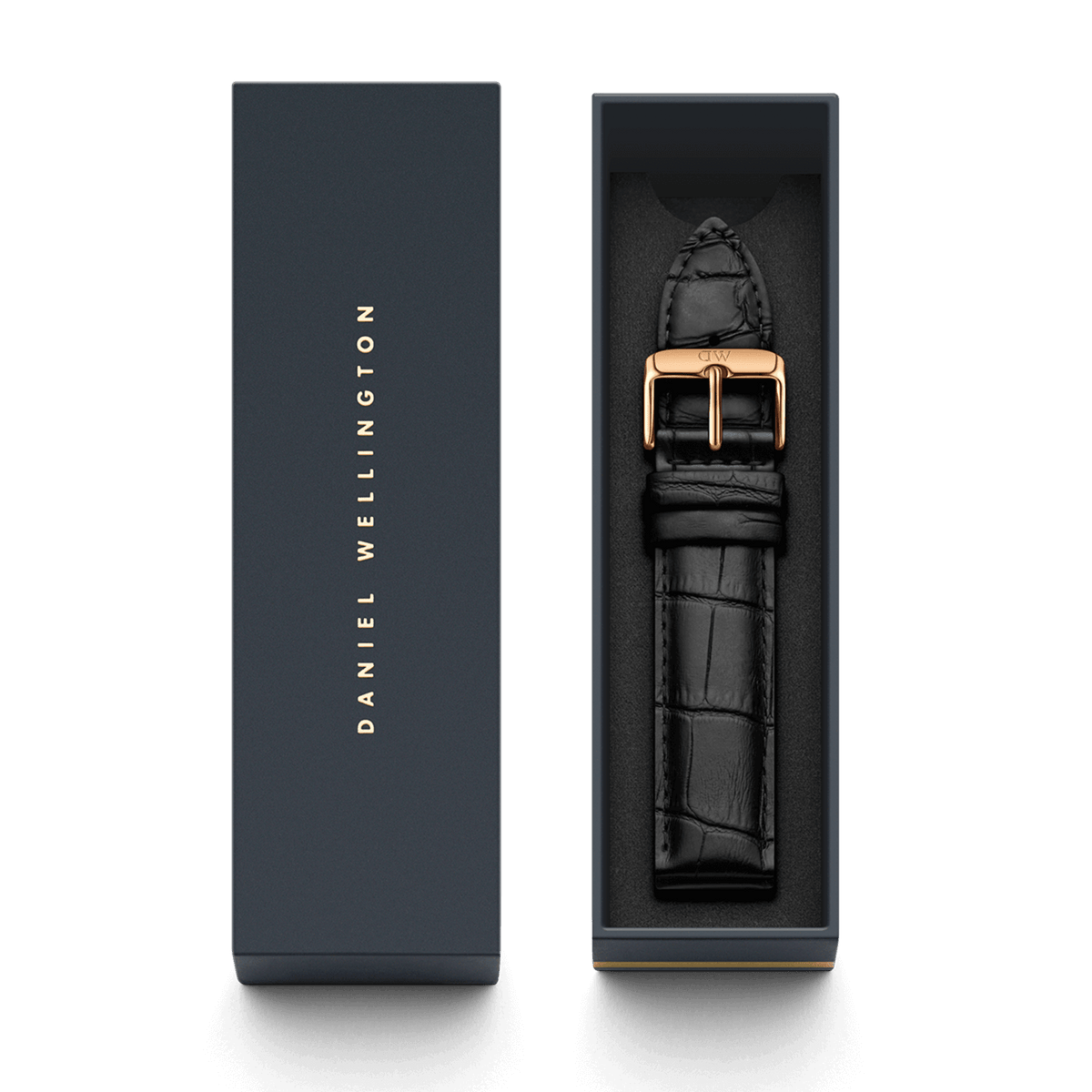 Reading Strap Rose Gold presented in a signature Daniel Wellington box, featuring a black croc-embossed leather watch strap with a polished rose gold buckle and engraved branding.