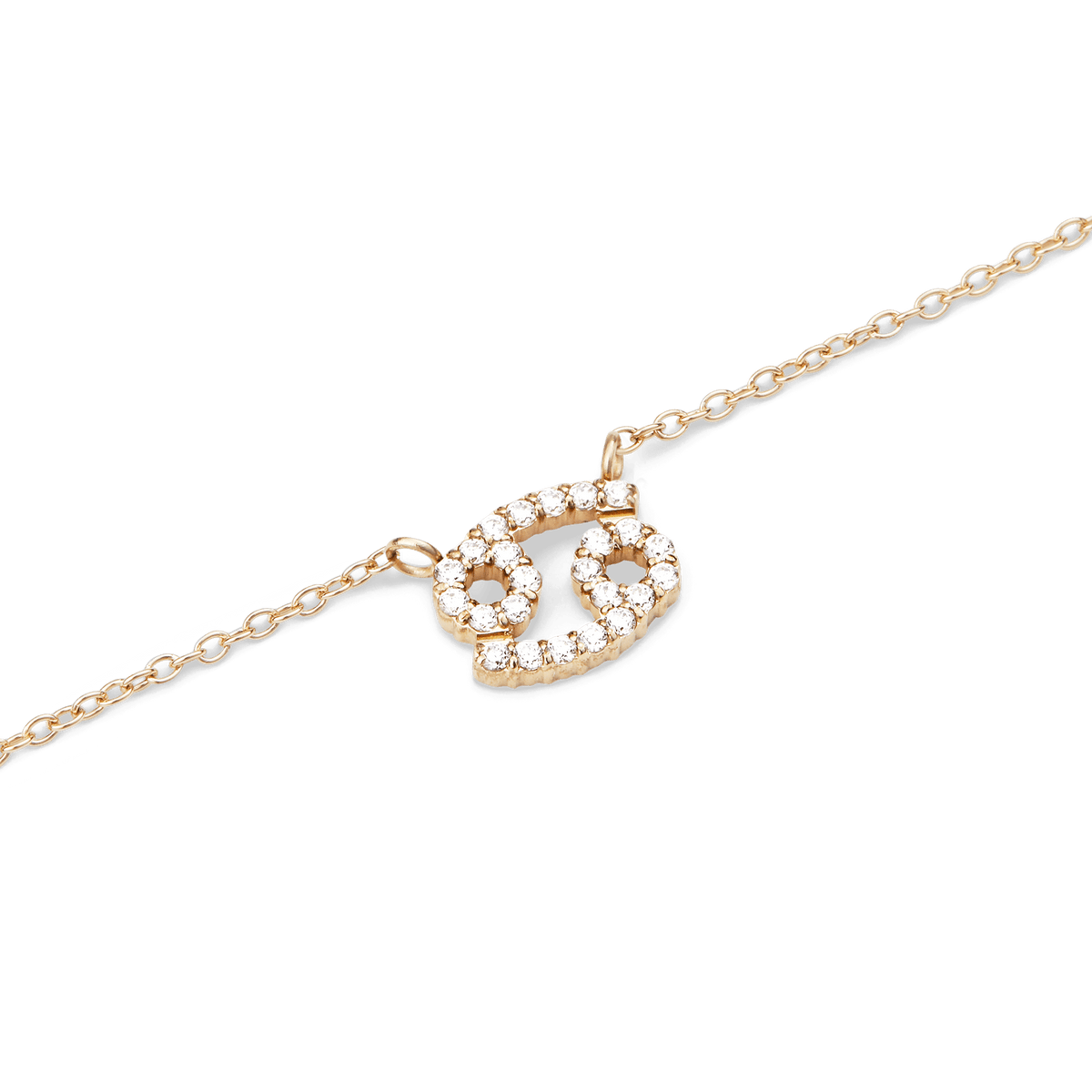 Gold chain necklace with a Cancer zodiac pendant encrusted with sparkling hand-set crystals.