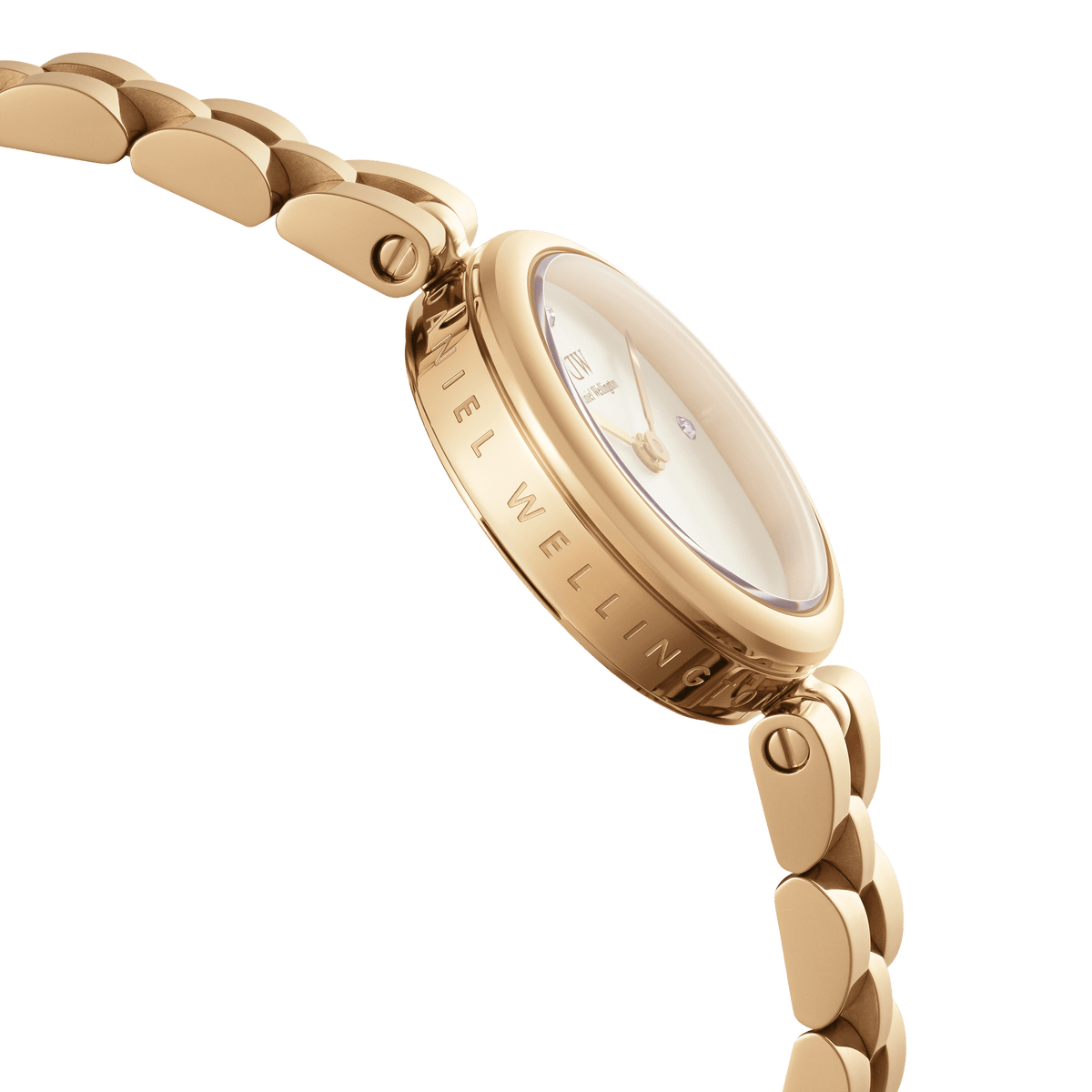 Close-up of Elan Lumine Gold women’s watch showing engraved gold case, crystal-accented dial, and polished bracelet links.