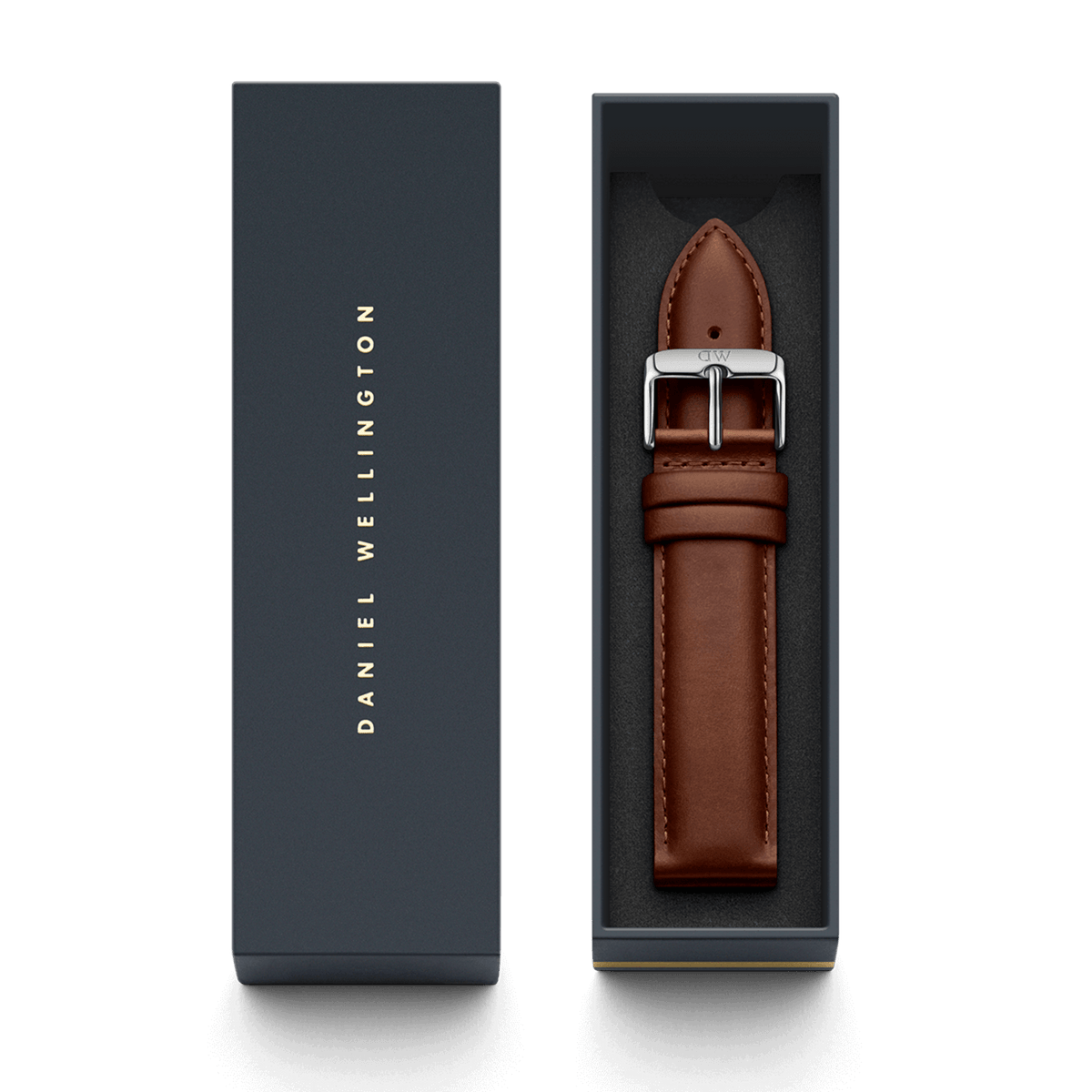 St Mawes XL Strap Silver presented in a sleek Daniel Wellington gift box, featuring light brown genuine leather with fine stitching and a polished silver buckle engraved with the brand’s monogram.