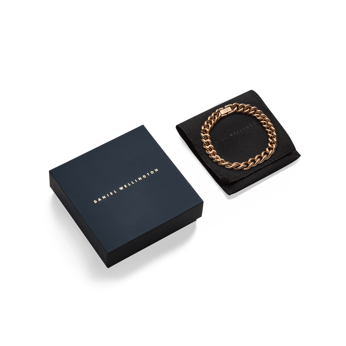 Chunky Chain Bracelet Rose Gold displayed on a black cushion beside a sleek Daniel Wellington gift box, highlighting its polished links and elegant presentation.