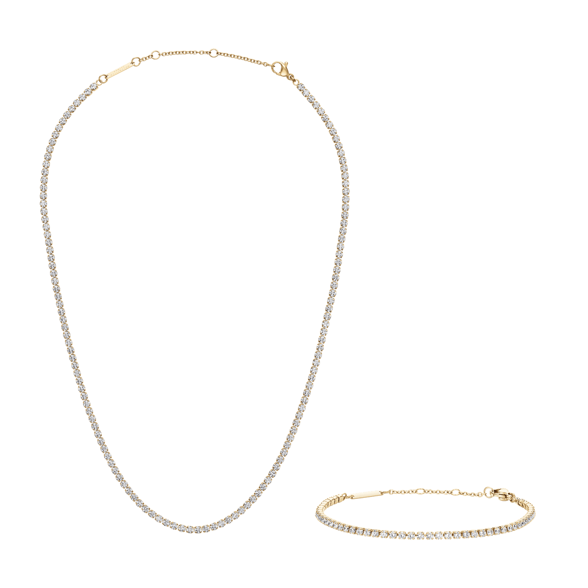 Gold-tone tennis necklace and bracelet set featuring rows of sparkling crystals, designed in a classic, elegant style for versatile everyday or special occasion wear.