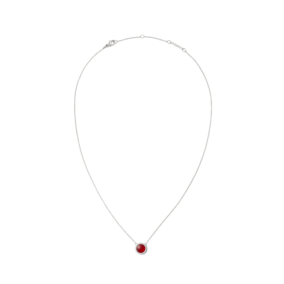 Delicate silver necklace with a domed red agate pendant and white cubic zirconia accents on a fine adjustable chain.