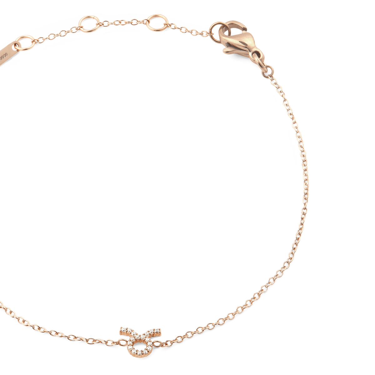 Slim rose gold chain bracelet with an adjustable clasp, featuring a sparkling crystal-set Taurus zodiac pendant as the centrepiece.