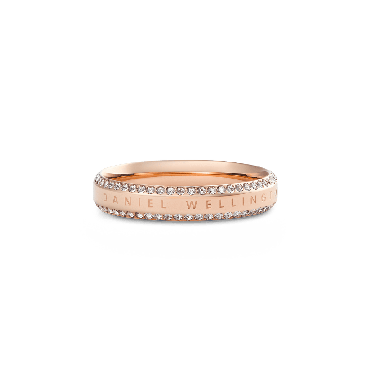 Rose gold Daniel Wellington ring with a polished band, featuring two rows of white cubic zirconia crystals along the edges and an engraved signature for a refined, modern look.