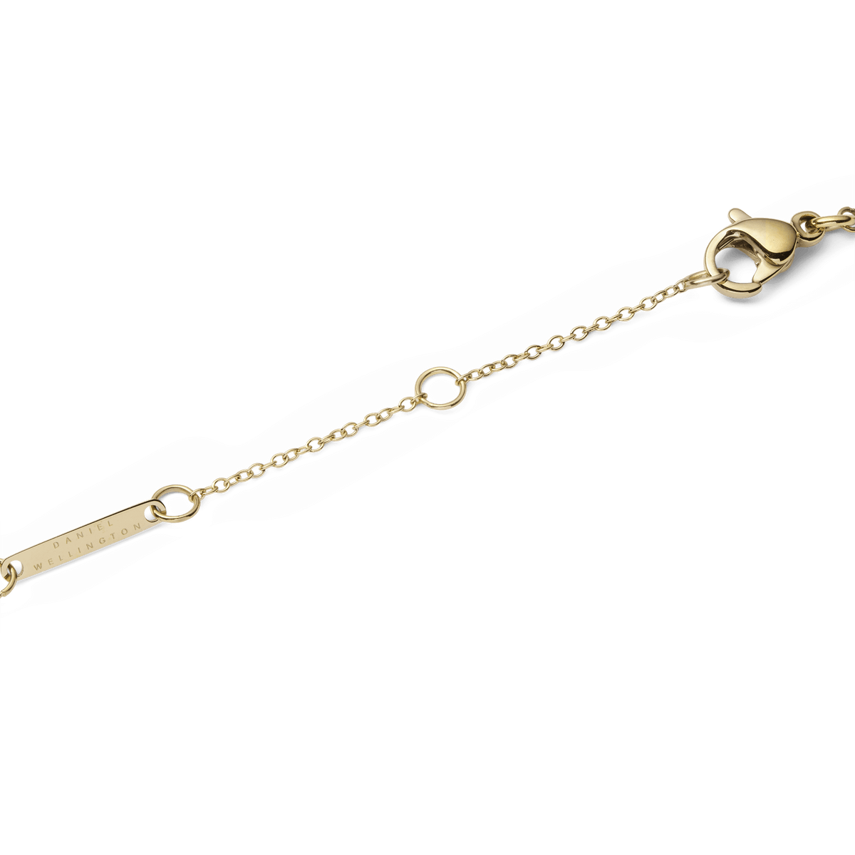 Detail of the Audrey Necklace Malachite Gold showing the fine gold chain with an adjustable clasp and a small engraved Daniel Wellington tag, highlighting the secure fastening and elegant finish.