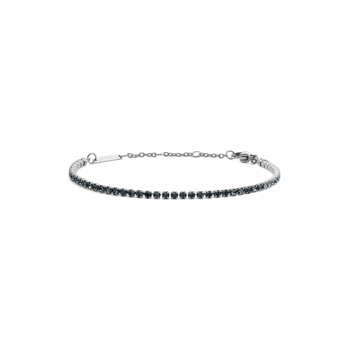 Slender silver tennis bracelet featuring individually set black Preciosa crystals along a fine chain, finished with an adjustable clasp for a secure and elegant fit.