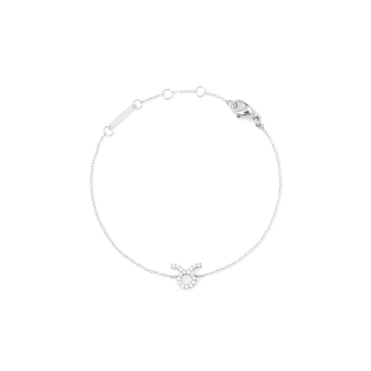 Slim silver chain bracelet featuring an adjustable fit and a Taurus zodiac charm set with sparkling cubic zirconia crystals.