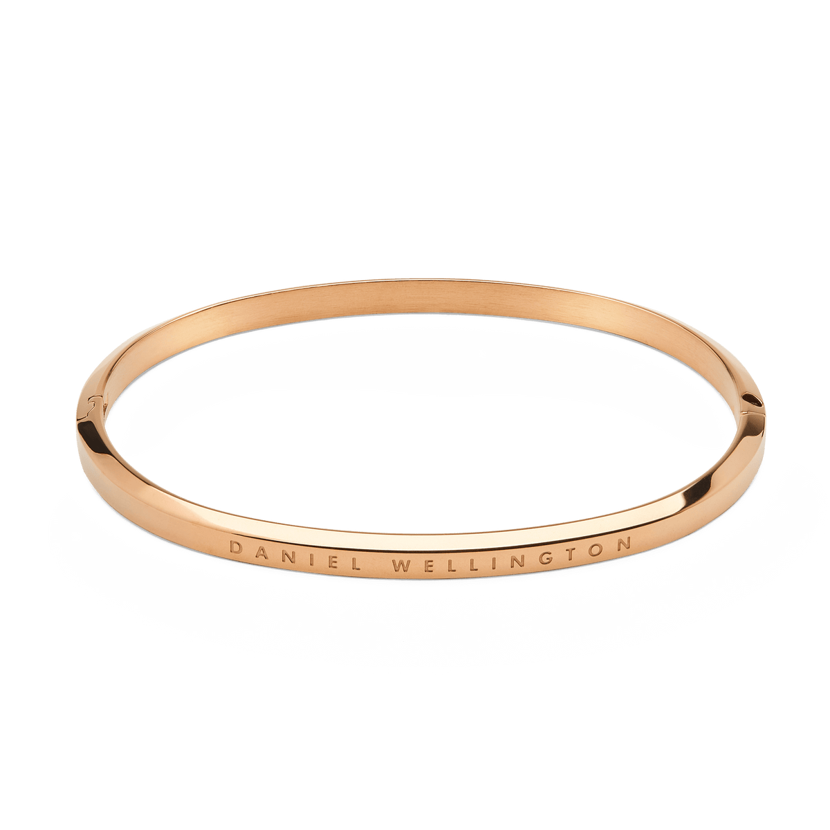 Classic Bangle Rose Gold featuring a slim, polished rose gold finish with Daniel Wellington engraving and a discreet hinge and lock closure.