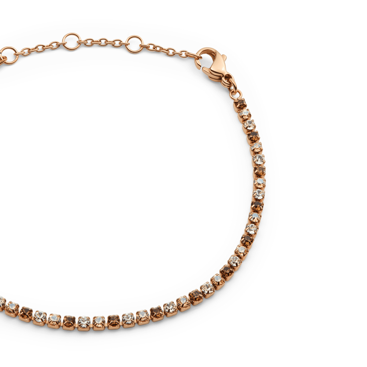 Close-up of the Classic Tennis Bracelet Honey Combo Rose Gold, highlighting its rose gold chain and individually set honey-toned Preciosa crystals with a secure lobster clasp.