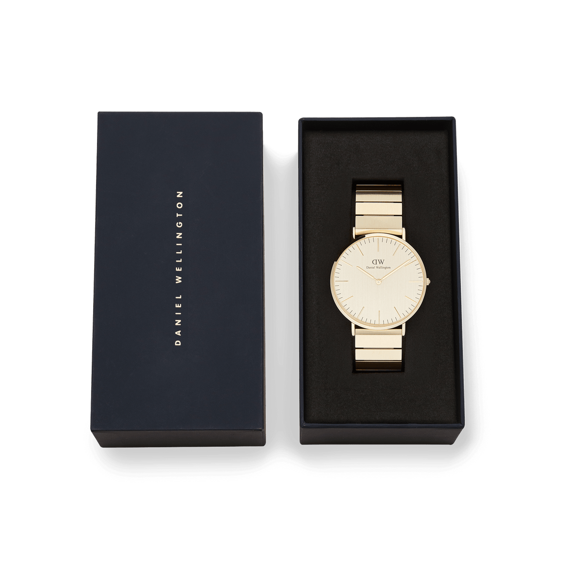 Classic Piano Link Gold Unitone watch with a brushed gold dial and piano link bracelet, elegantly presented in a black Daniel Wellington gift box.