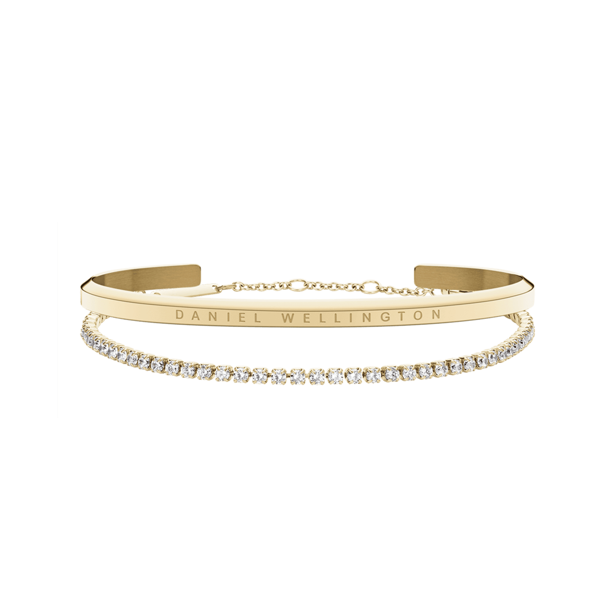 Gold bracelet set featuring a polished Daniel Wellington engraved cuff paired with a delicate tennis bracelet adorned with sparkling crystals, designed for elegant stacking and everyday sophistication.