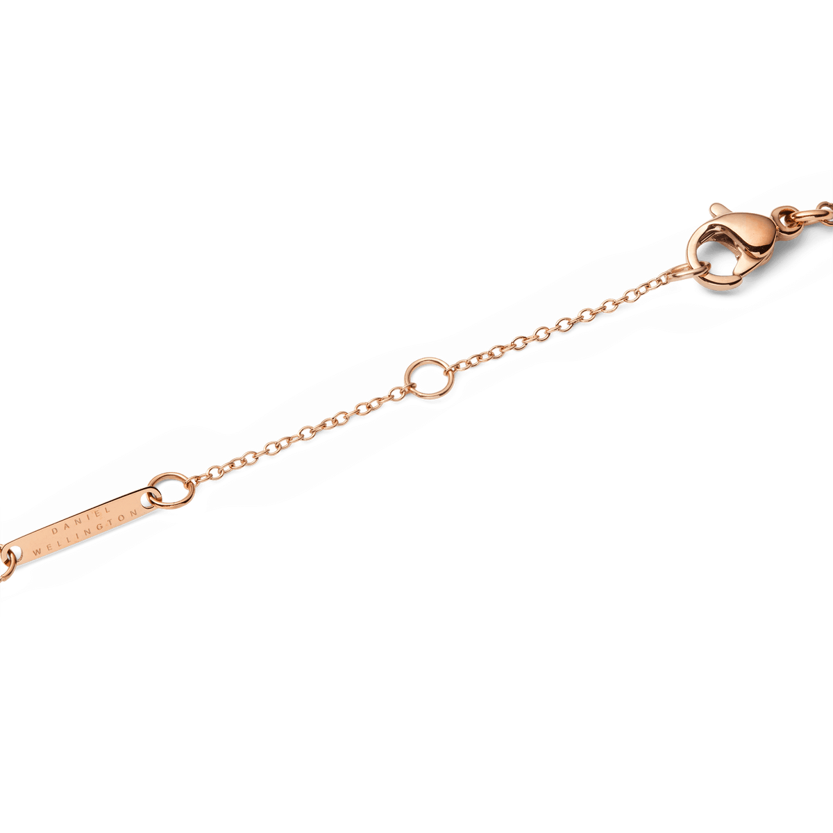 Rose gold adjustable chain with lobster clasp and Daniel Wellington tag, part of the Audrey Necklace in red agate.
