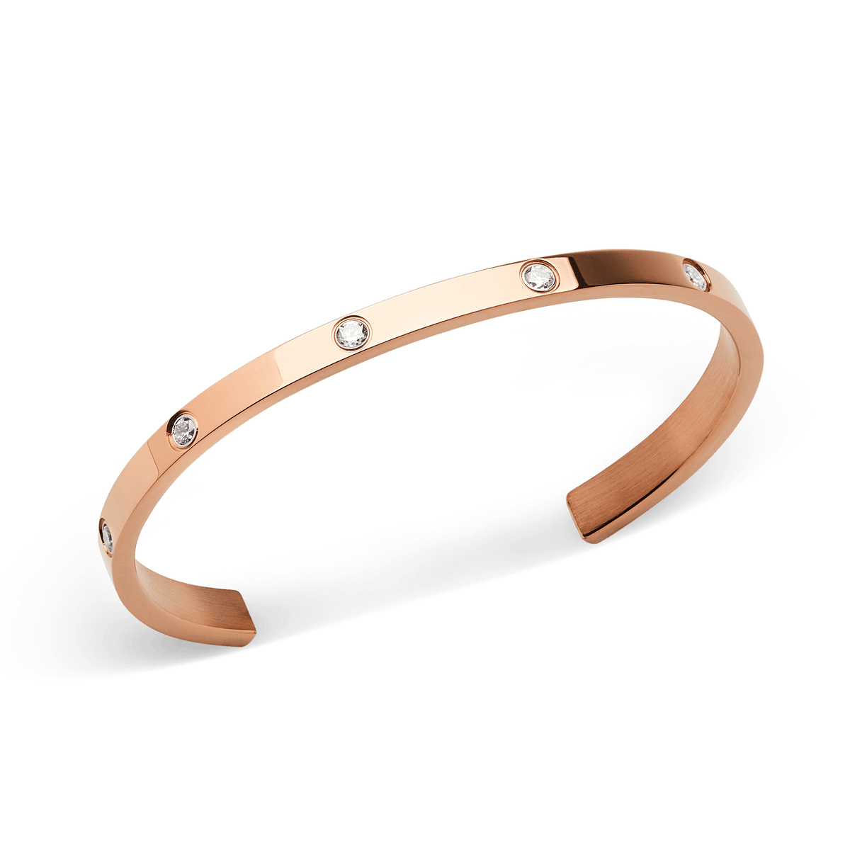 Classic Lumine Bracelet Rose Gold 55mm featuring a sleek open bangle design in polished rose gold stainless steel, set with eight sparkling cubic zirconia crystals for a refined, minimalist look.