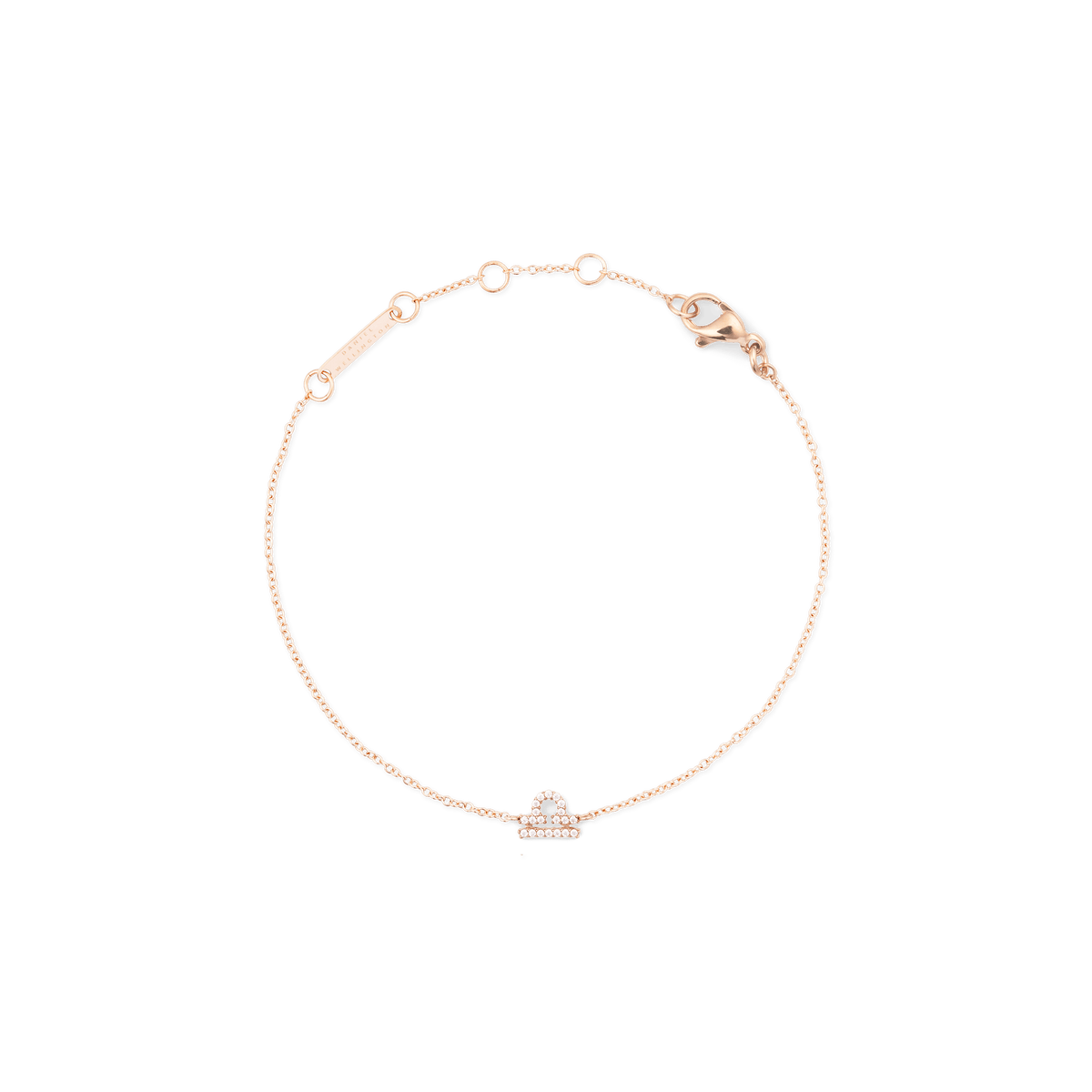 Rose gold chain bracelet featuring a sparkling Libra zodiac pendant with hand-set crystals and adjustable sizing rings.