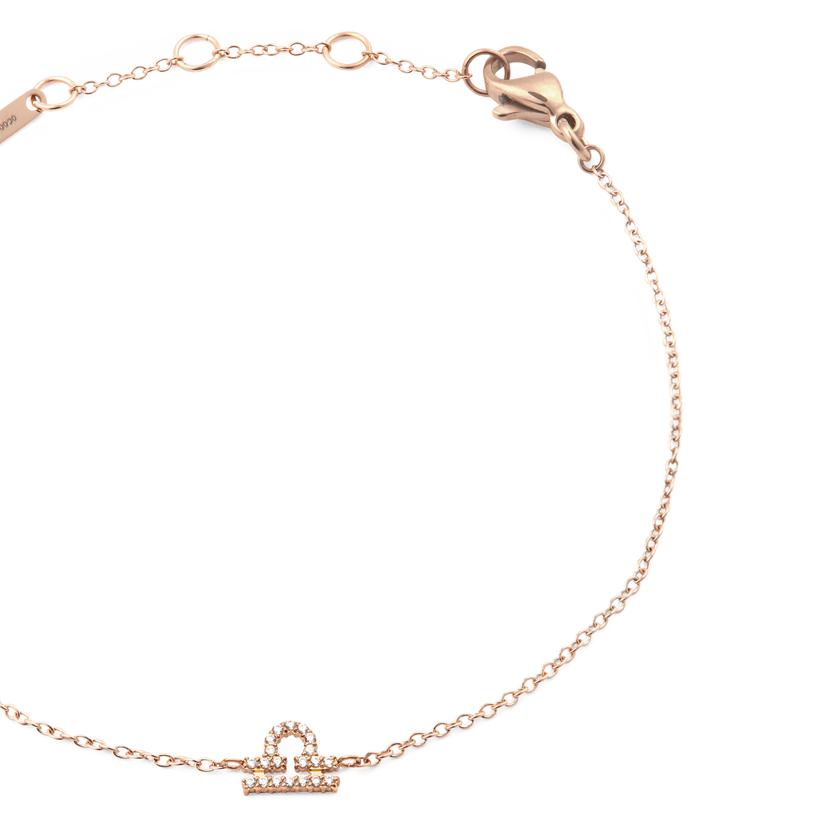 Delicate rose gold chain bracelet featuring a crystal-set zodiac pendant and adjustable sizing rings, finished with a secure lobster clasp.