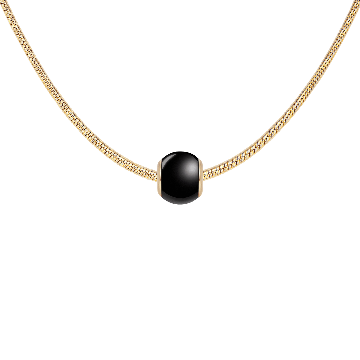 Black Orb Charm G in smooth black ceramic with gold PVD-plated stainless steel accents, elegantly styled on a gold snake chain necklace for a modern, sophisticated look.