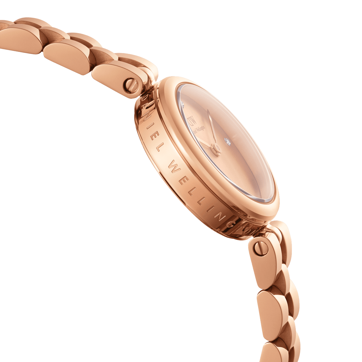 Close-up side view of the Elan Lumine Unitone Rose Gold watch, highlighting the engraved Daniel Wellington branding on the rose gold case and the polished three-link bracelet.