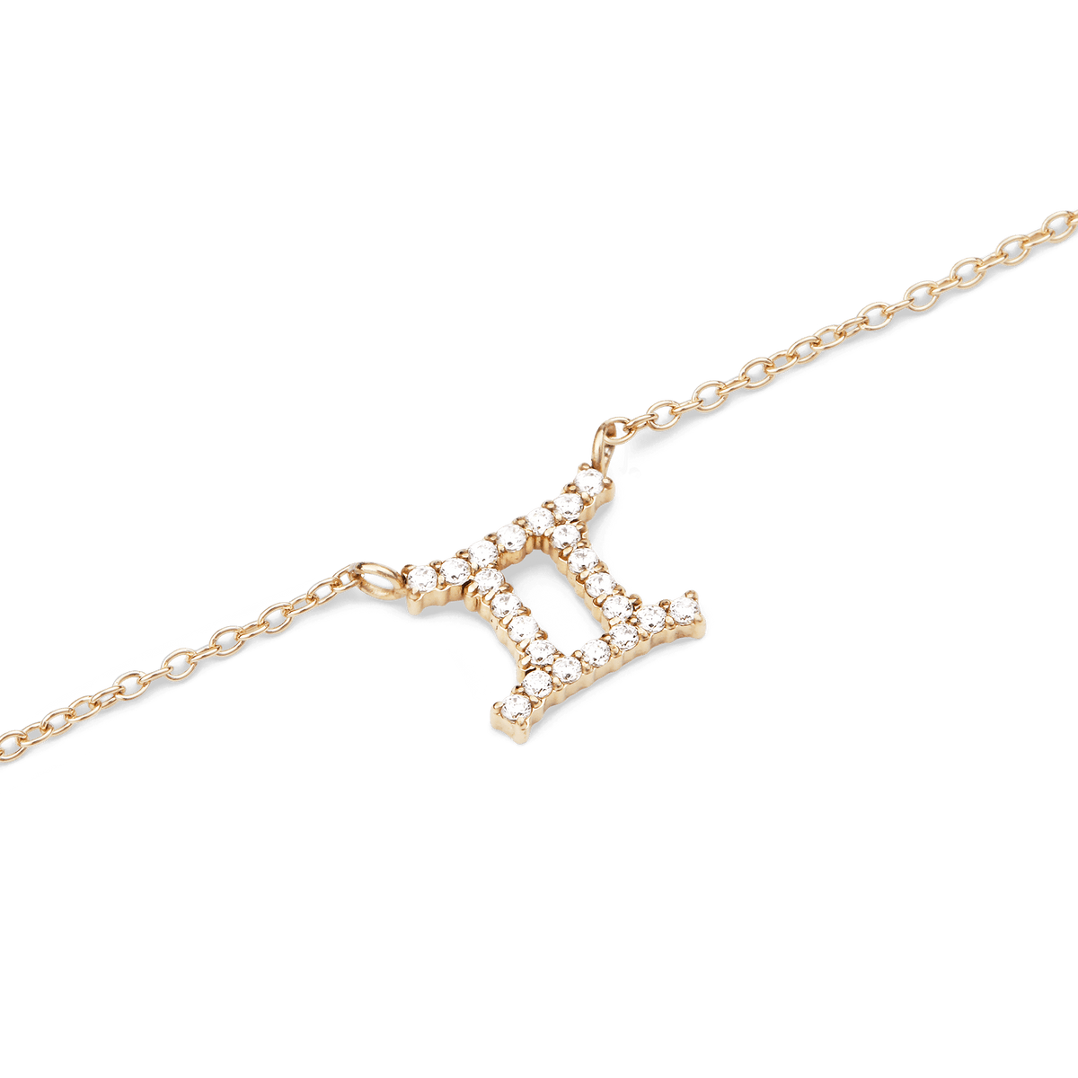 Close-up of the Crystal Zodiac Chain Necklace Gold featuring a Gemini pendant adorned with sparkling hand-set crystals on a fine gold-plated chain.