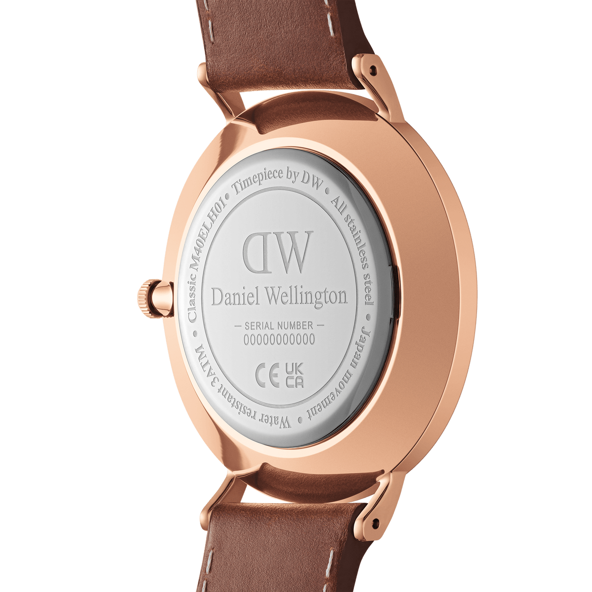 Caseback of the Classic Multi-Eye St Mawes Arctic Rose Gold watch showing the engraved Daniel Wellington branding, stainless steel details, and brown leather strap.