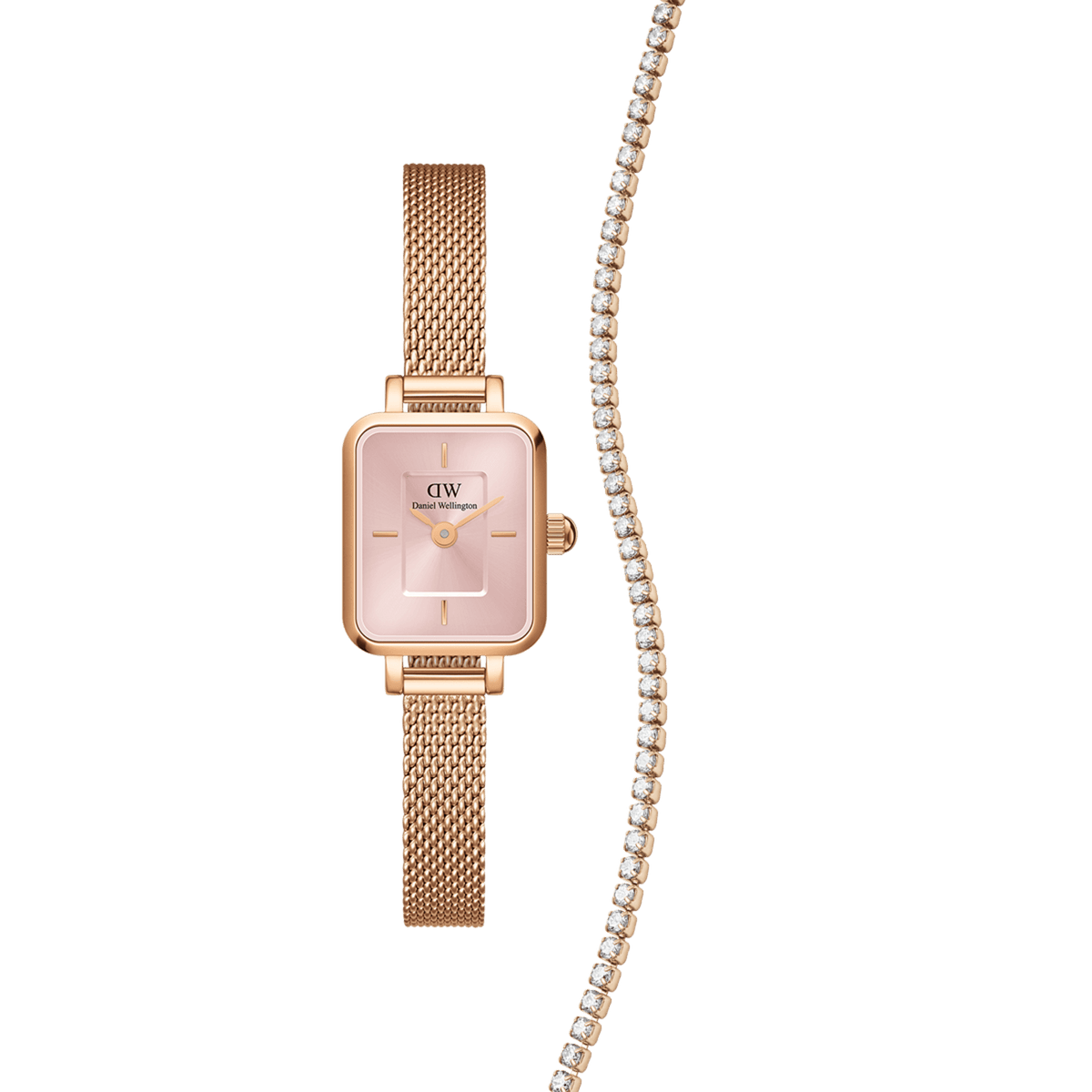 Rose gold rectangular ladies’ watch with a blush pink face and mesh strap, paired with a matching tennis necklace featuring sparkling stones.
