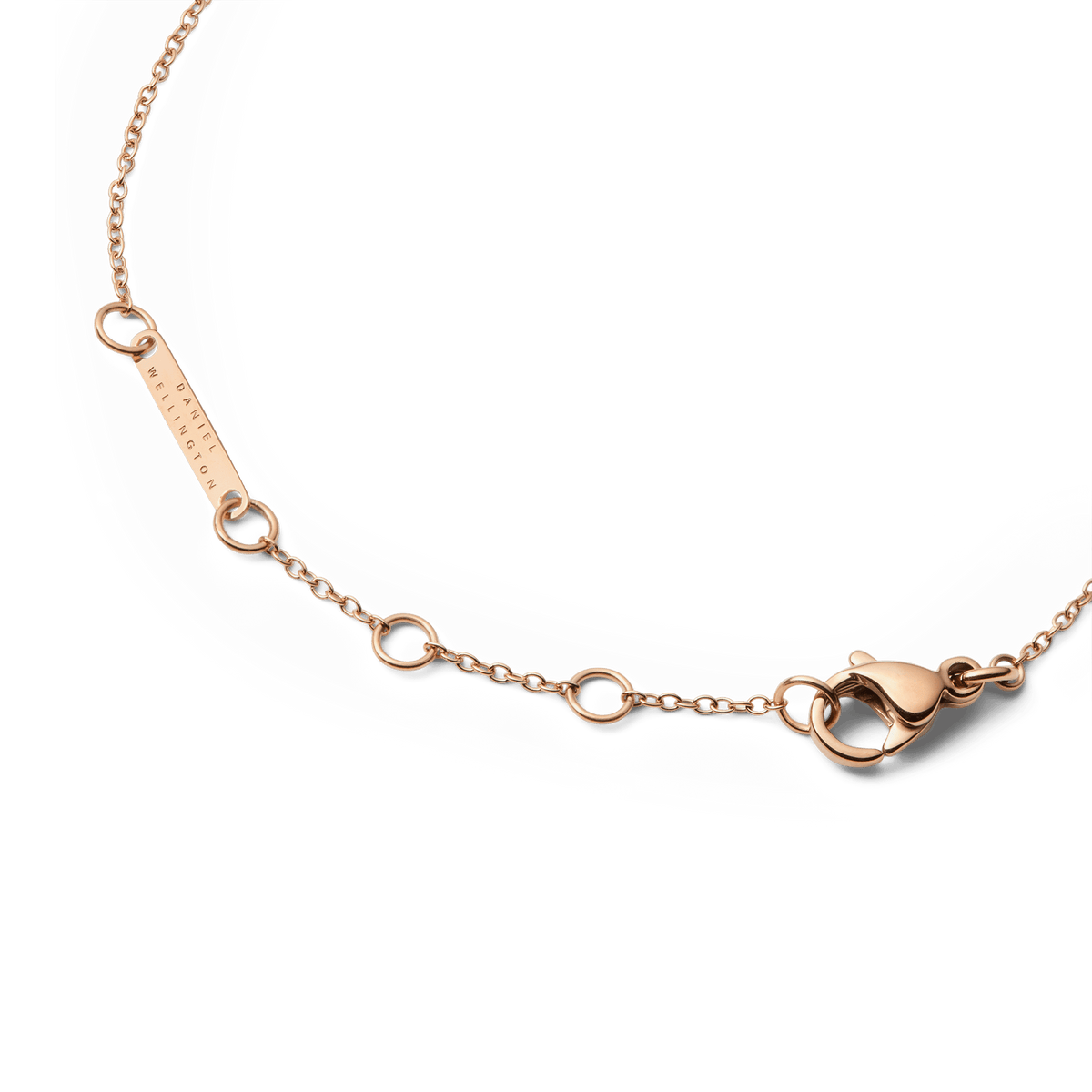 Adjustable rose gold bracelet chain with lobster clasp and Daniel Wellington tag, designed for a secure, personalised fit.