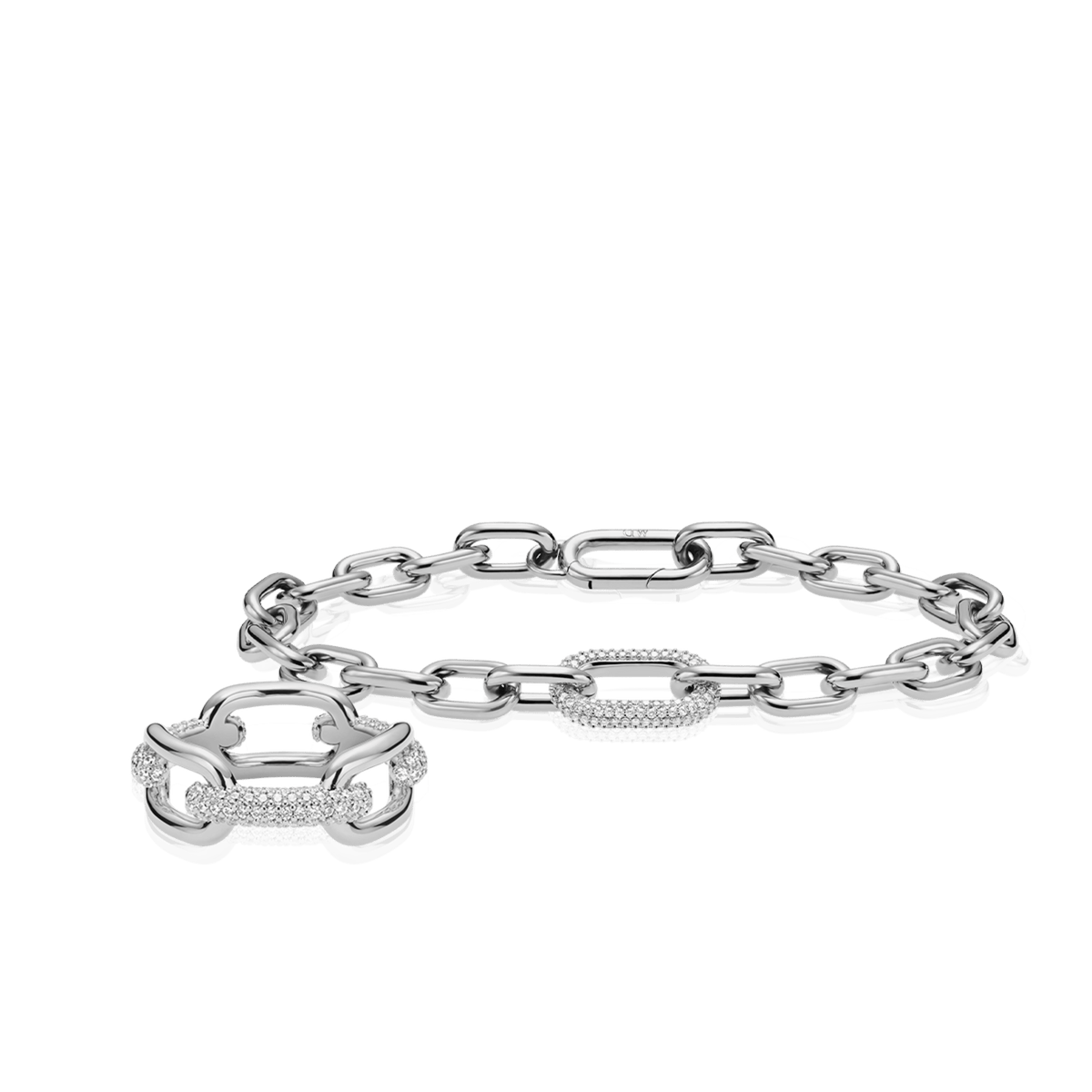 Silver chain bracelet and matching ring set featuring geometric links with crystal-encrusted accents, showcasing a modern, polished finish. The coordinated design highlights subtle sparkle and contemporary style.