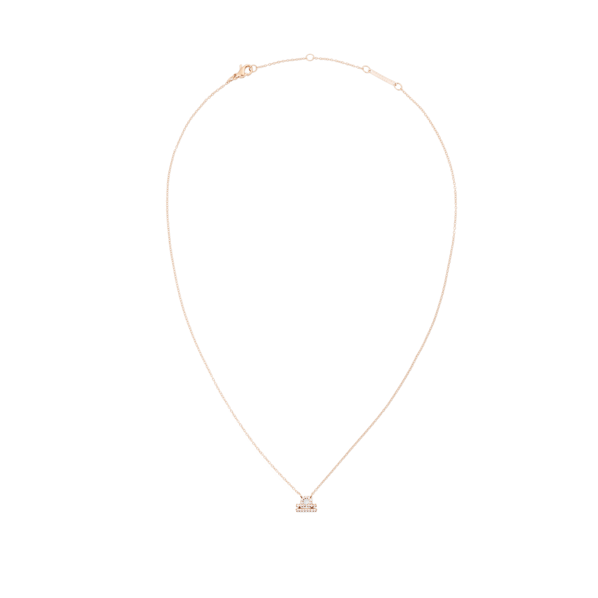 Slim rose gold chain necklace with an elegant crystal-set zodiac pendant, featuring an adjustable length and minimalist design.
