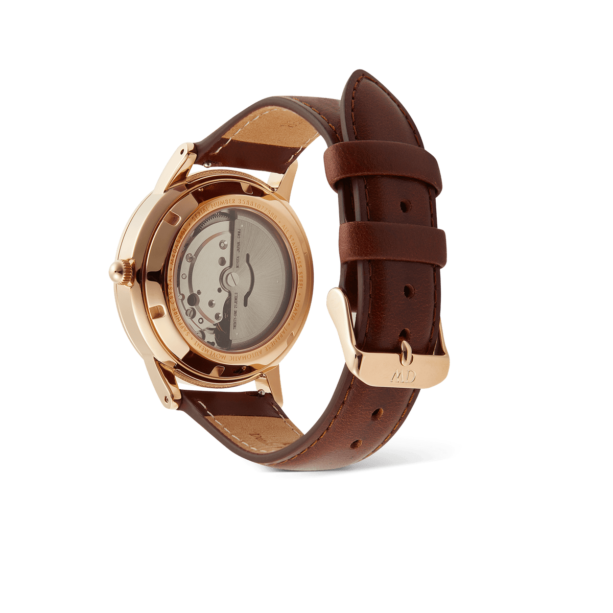 Daniel Wellington Iconic St Mawes Automatic Rose Gold watch showing the exhibition case back with visible automatic movement and brown Italian leather strap.