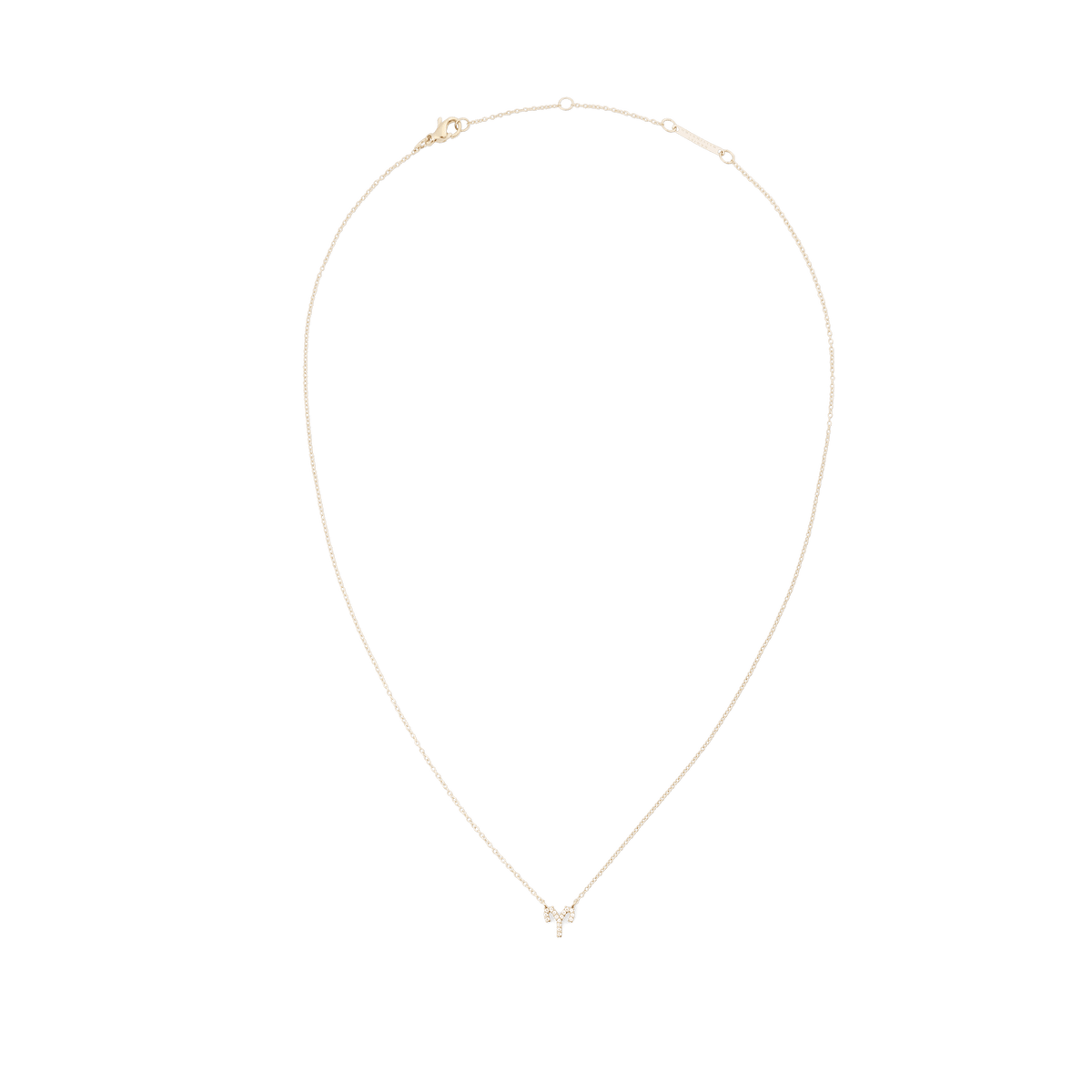 Slim gold chain necklace with an Aries zodiac pendant adorned with sparkling crystals.