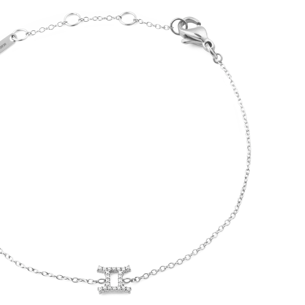 Close-up of the Crystal Zodiac Chain Bracelet Silver, highlighting the adjustable fine chain and Gemini zodiac charm set with sparkling cubic zirconia crystals.