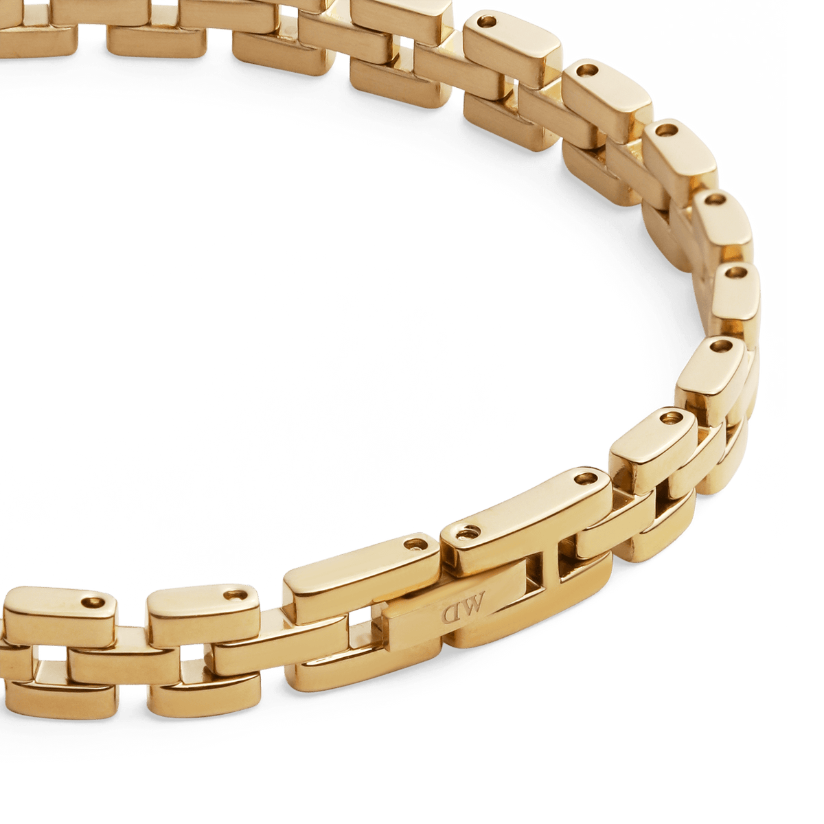 Detail view of the 3-Link Bracelet Gold, showcasing its polished gold-plated links and subtle engraved branding on the clasp.