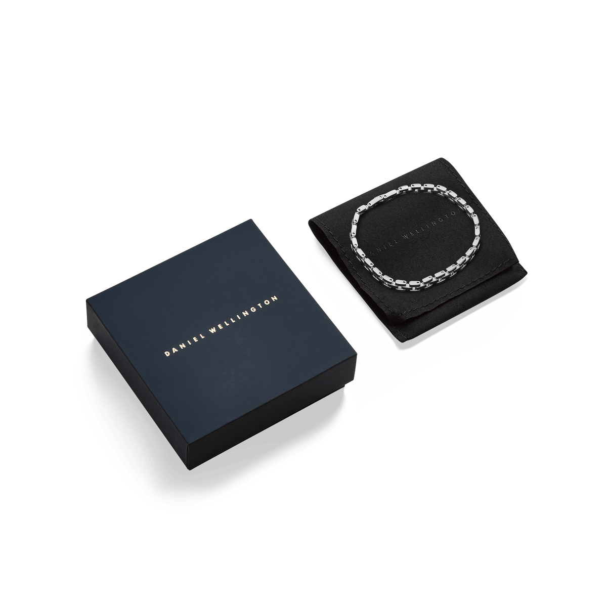 3-Link Bracelet Silver displayed on a black pouch beside a premium Daniel Wellington gift box, highlighting its elegant packaging.