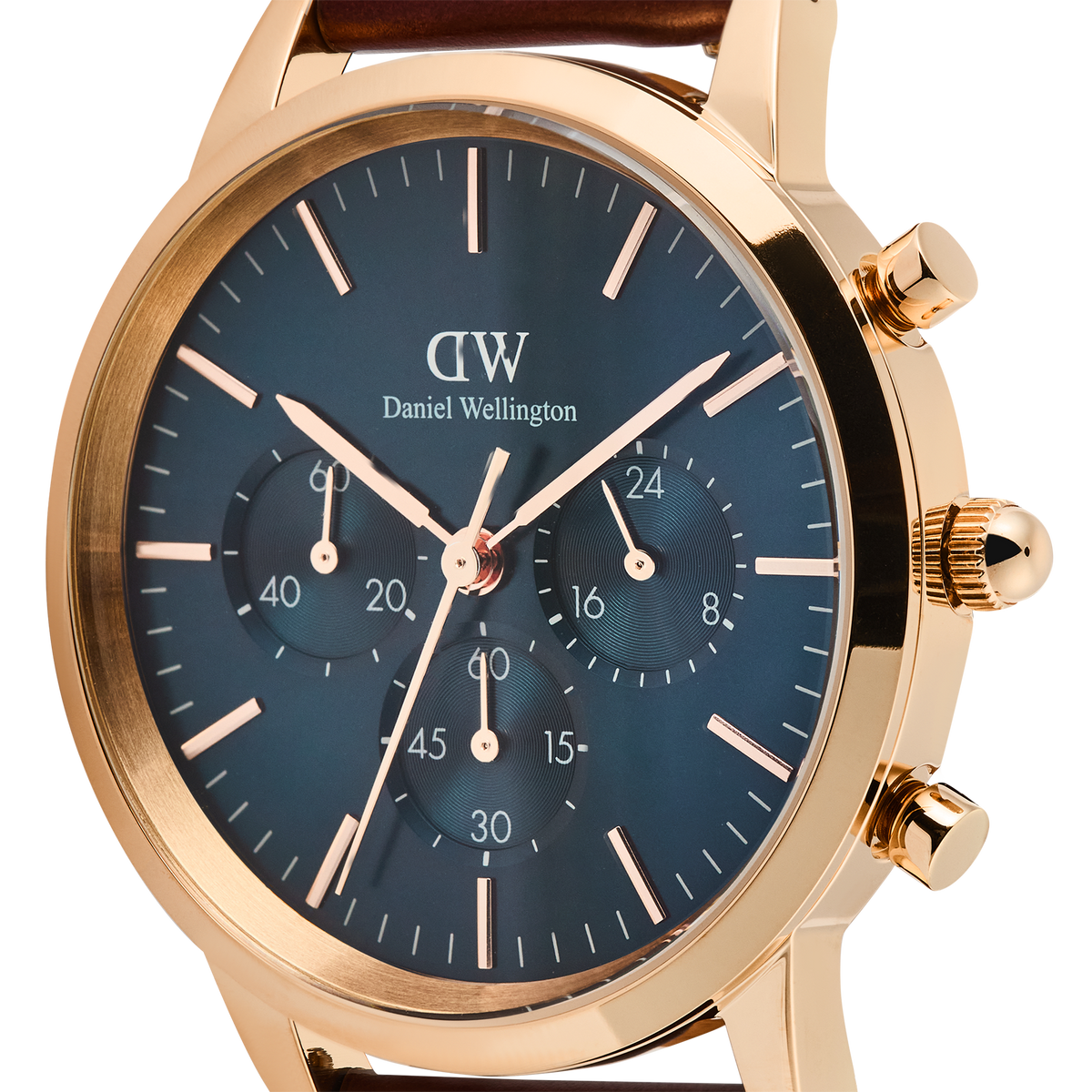 Close-up of the Daniel Wellington Iconic Chronograph St Mawes Arctic Rg watch, highlighting its rose gold case, deep blue sunray dial, and three chronograph sub-dials.