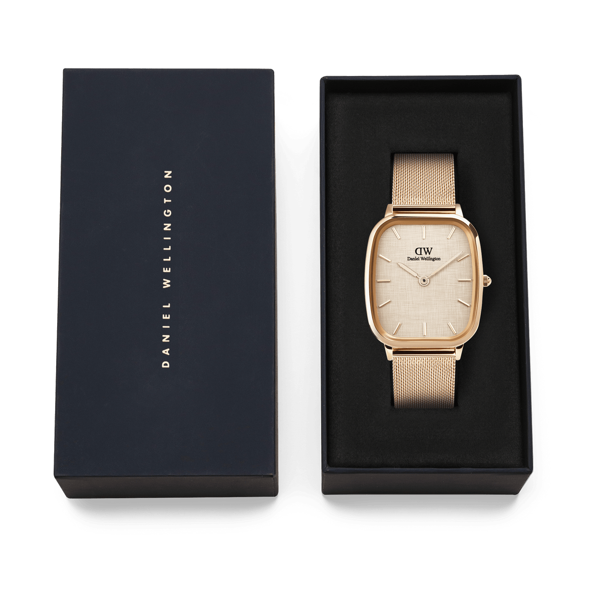 Daniel Wellington Marlon Melrose Linen watch with a rose gold mesh strap and linen-textured dial, elegantly presented in a navy gift box with gold branding.